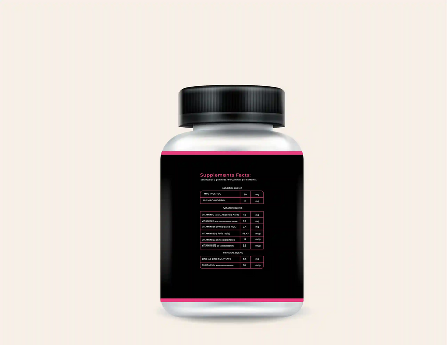 Bottle of PCOS Support Gummies with a black and pink label showing supplement facts, including inositol, vitamins, and minerals.